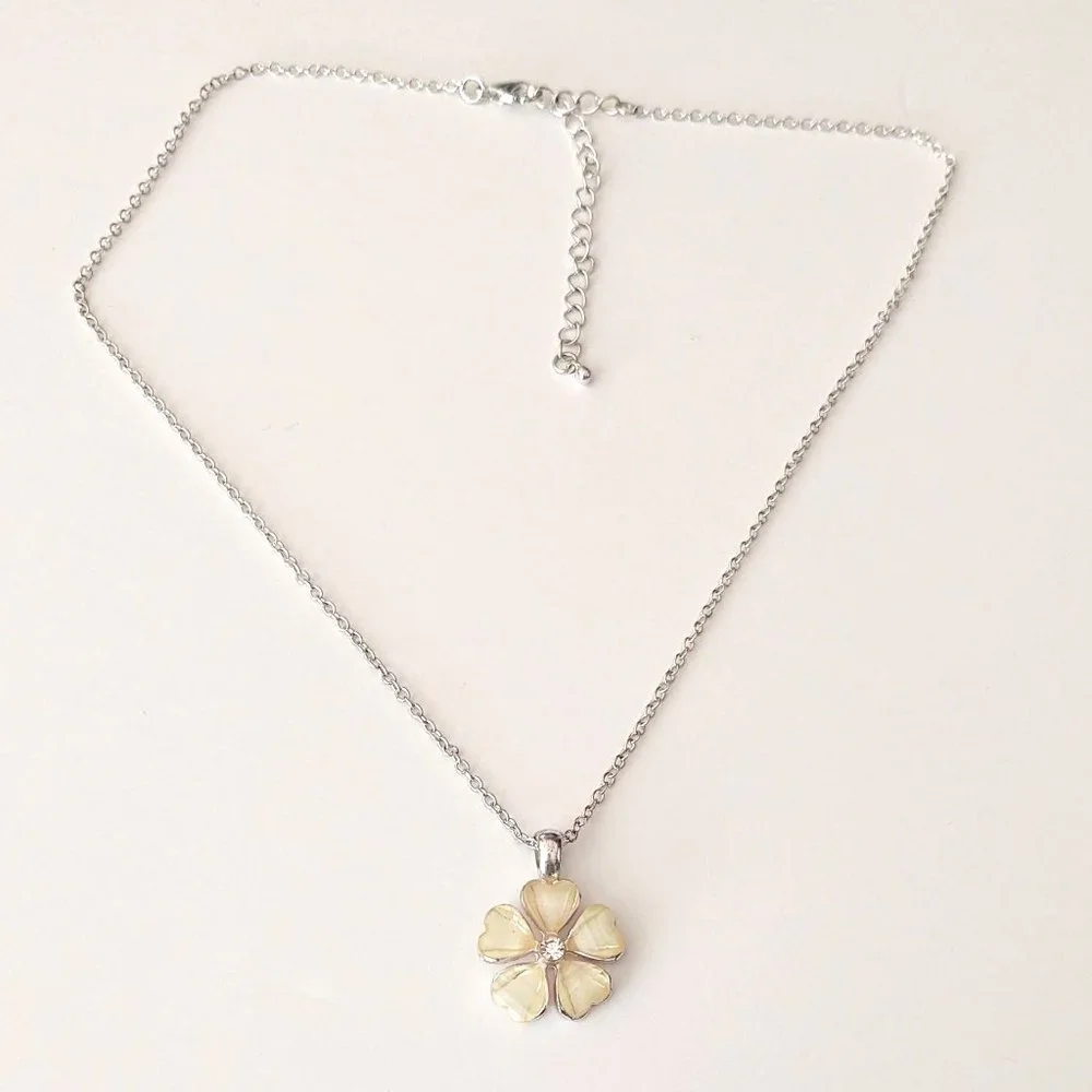 Cream flower pendant necklace with cz center and silver accents